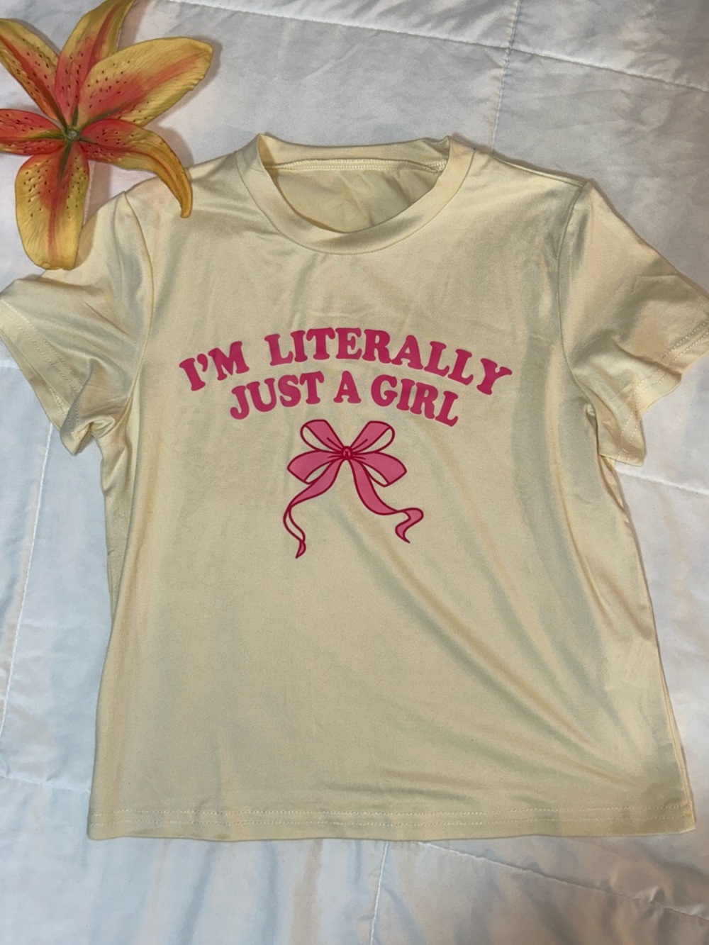 Amazon Cream Girls' Tee with Pink Bow Graphic
